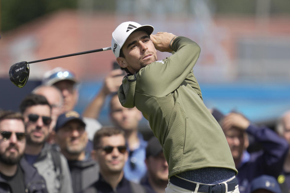 Chile's Joaquin Niemann plays his tee shot on the 12th hole during a practice round for the British Open Golf Championships at the Royal Liverpool Golf Club in Hoylake, England, Wednesday, July 19, 2023. The Open starts Thursday, July 20. (AP Photo/Kin Cheung)