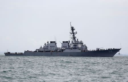 The U.S. Navy guided-missile destroyer USS John S. McCain is seen after a collision, in Singapore waters August 21, 2017. REUTERS/Ahmad Masood