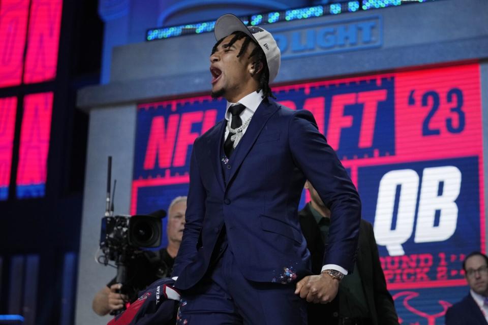 Ohio State quarterback C.J. Stroud reacts after being chosen by the Houston Texans with the second pick of the NFL draft.