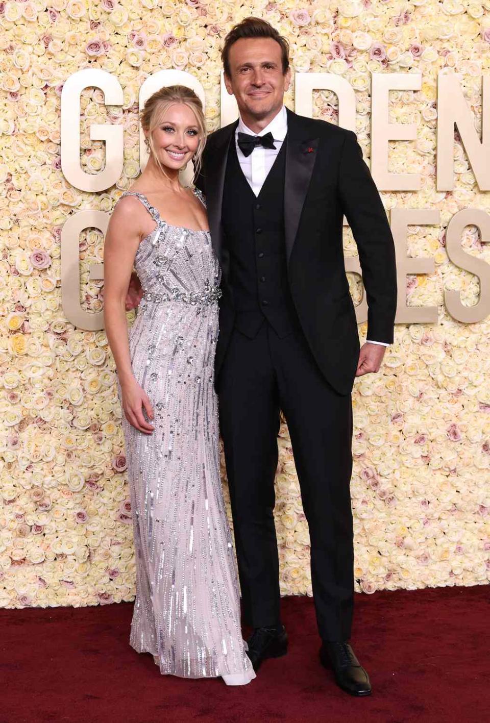 <p>Amy Sussman/Getty</p> Kayla Radomski and Jason Segel attend the 81st annual Golden Globe Awards at The Beverly Hilton on Jan. 07 in Beverly Hills, California