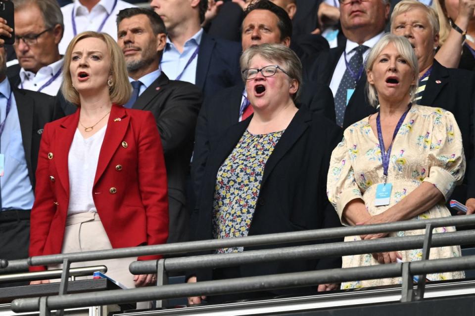 Thérèse Coffey (middle), with Liz Truss (left) and Nadine Dorries (right) (AFP via Getty Images)
