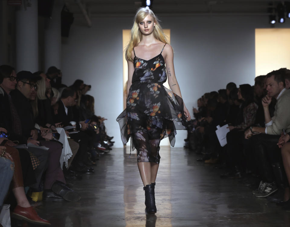 The Peter Som Fall 2014 collection is modeled during Fashion Week in New York, Friday, Feb. 7, 2014. (AP Photo/Richard Drew)