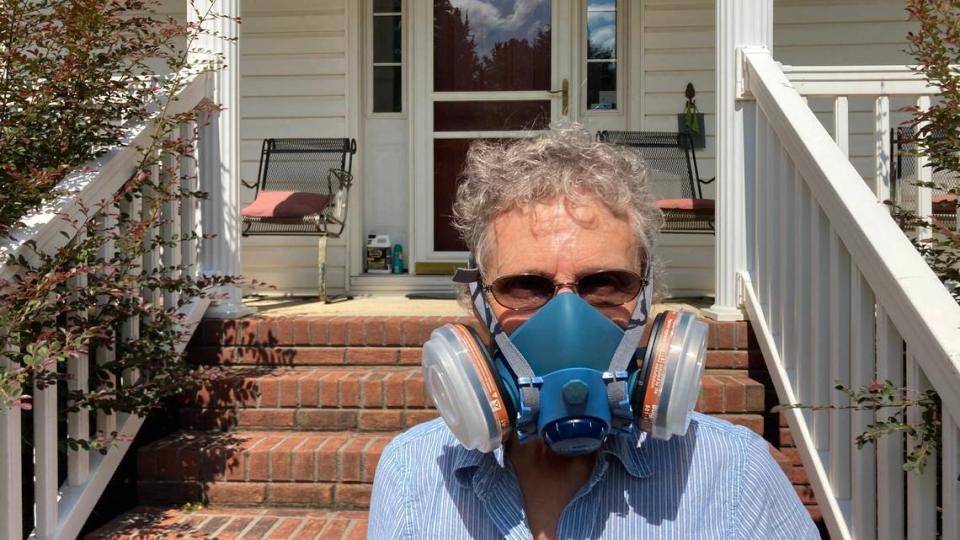 York County resident Betty Rankin wore a gas mask after odors from a paper mill wafted over her community. The New Indy paper company received approval from SC regulators to remove a pollution control device that contributed to the powerful odors.