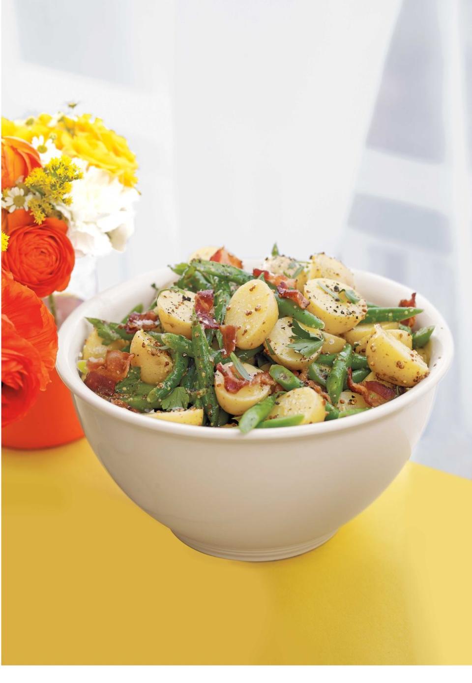 <p>This potato and green bean salad puts a spin on your typical bean dish. There's even a little bit of bacon for pure indulgence. </p><p>Get the <strong><a href="https://www.womansday.com/food-recipes/food-drinks/recipes/a12223/potato-green-bean-salad-recipe-wdy0712/" rel="nofollow noopener" target="_blank" data-ylk="slk:Potato and Green Bean Salad recipe;elm:context_link;itc:0;sec:content-canvas" class="link ">Potato and Green Bean Salad recipe</a></strong>.</p><p><a class="link " href="https://www.amazon.com/Maille-71256-Wholegrain-Mustard-210g/dp/B0053OD50A?tag=syn-yahoo-20&ascsubtag=%5Bartid%7C10070.g.2641%5Bsrc%7Cyahoo-us" rel="nofollow noopener" target="_blank" data-ylk="slk:Shop Whole-grain Mustard;elm:context_link;itc:0;sec:content-canvas">Shop Whole-grain Mustard</a></p>