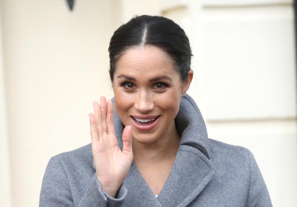 At her last appearance before Christmas, Meghan Markle jokes about 'looking very pregnant today' but says she feels 'good.'