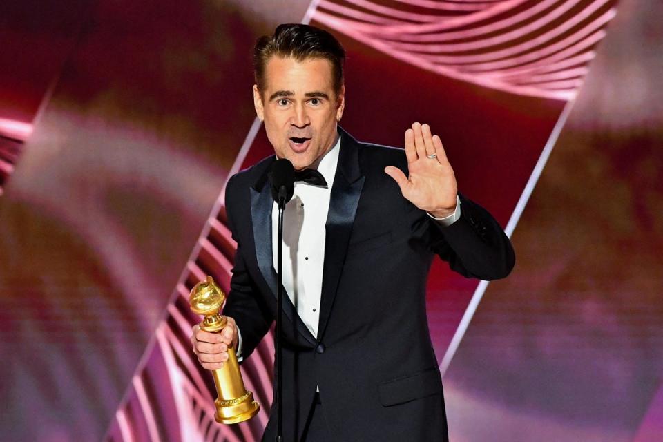 Farrell with his Golden Globe (via REUTERS)