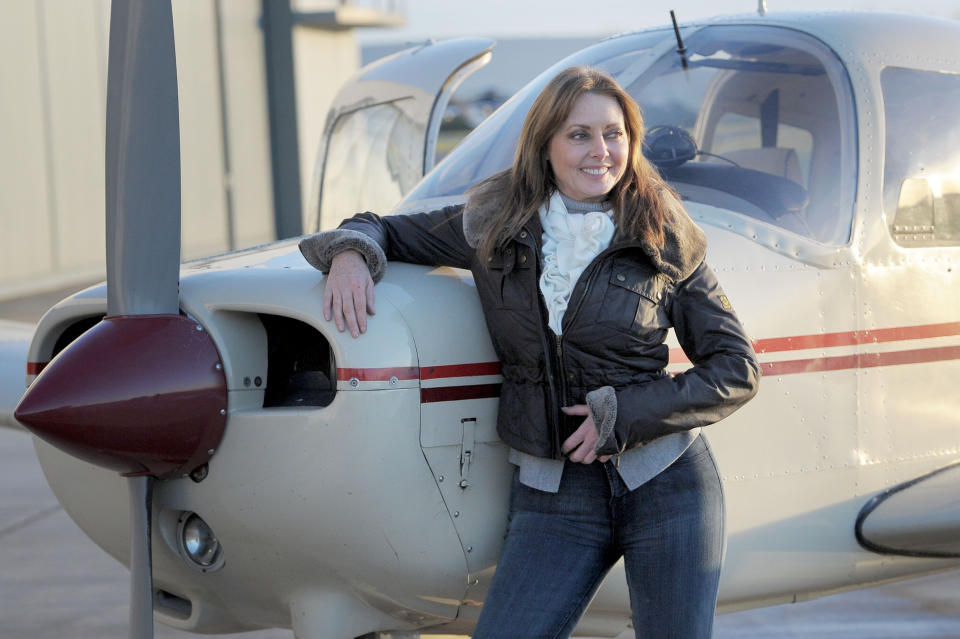 Carol Vorderman at the Staverton Flying School at Gloucester Airport after passing her private pilot's licence  in 2013. (Getty Images)