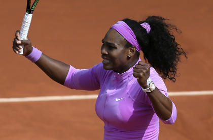 Serena Williams of the U.S. reacts as she defeats compatriot Sloane Stephens during their fourth round match of the French Open tennis tournament at the Roland Garros stadium, Monday, June 1, 2015 in Paris. Williams won 1-6, 7-5, 6-3. (AP Photo/David Vincent)