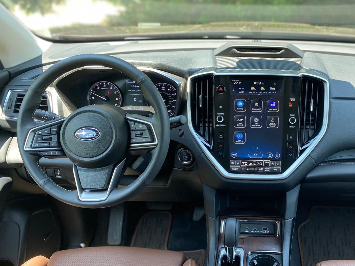 The 2024 Subaru Ascent's front dash features an 11.6-inch infotainment screen and is trimmed in black leather.