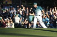 Sergio Garcia of Spain celebrates an eagle putt on the 15th hole in final round play during the 2017 Masters golf tournament at Augusta National Golf Club in Augusta, Georgia, U.S., April 9, 2017. REUTERS/Lucy Nicholson