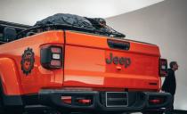 <p>To hold all the climbing gear that one could want, Jeep has added a custom storage system of lockable sliding drawers to the bed, with a set of Mopar cross rails and a special cargo basket mounted on top of it.</p>