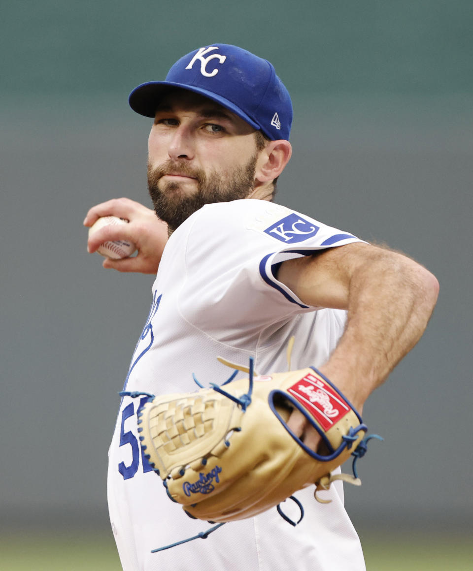 Kansas City Royals pitcher Michael Wacha throws to a Cleveland Guardians batter during the first inning of a baseball game in Kansas City, Mo., Thursday, June 27, 2024. (AP Photo/Colin E. Braley)