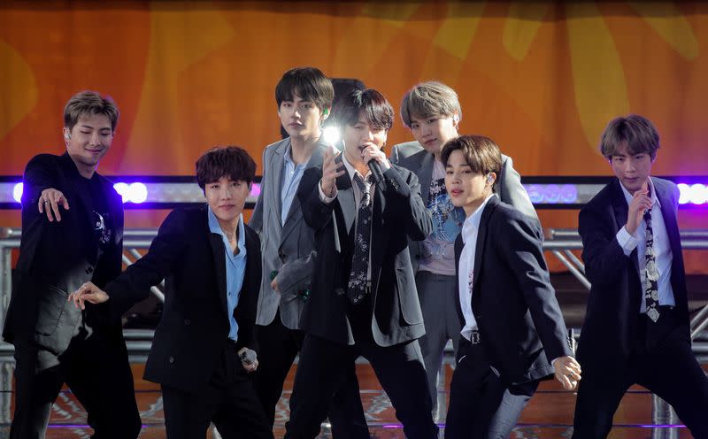 FILE PHOTO: Members of K-Pop band, BTS perform on ABC's 'Good Morning America' show in Central Park in New York