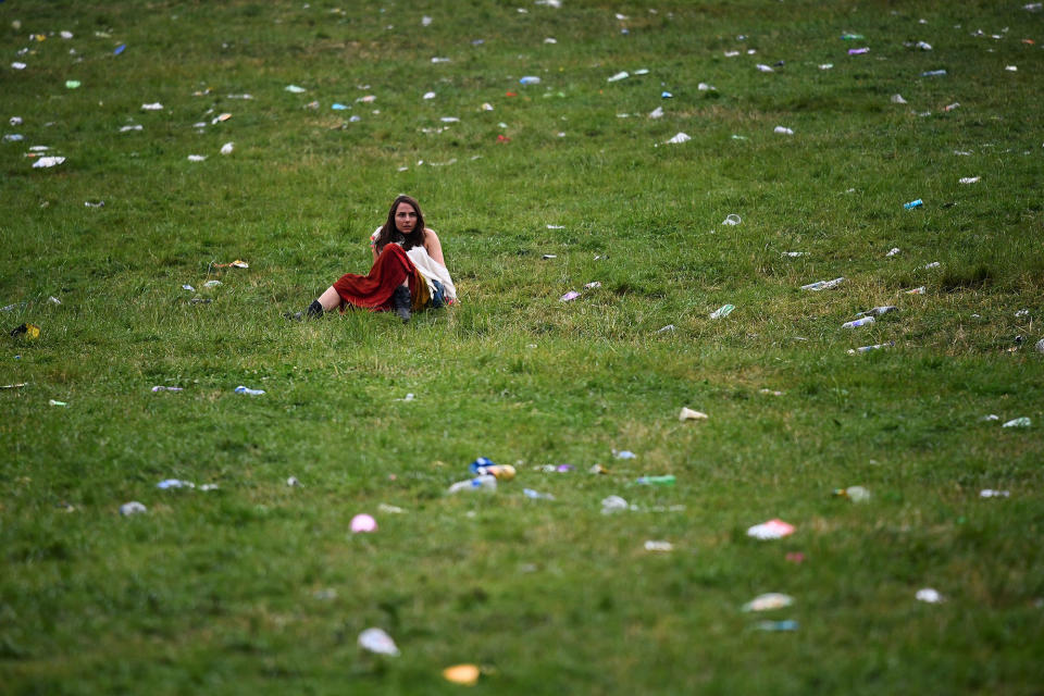 <p>A reveller relaxes by the Stone Circle at Worthy Farm in Somerset during the Glastonbury Festival, in Britain June 22, 2017. (Photo: Dylan Martinez/Reuters) </p>