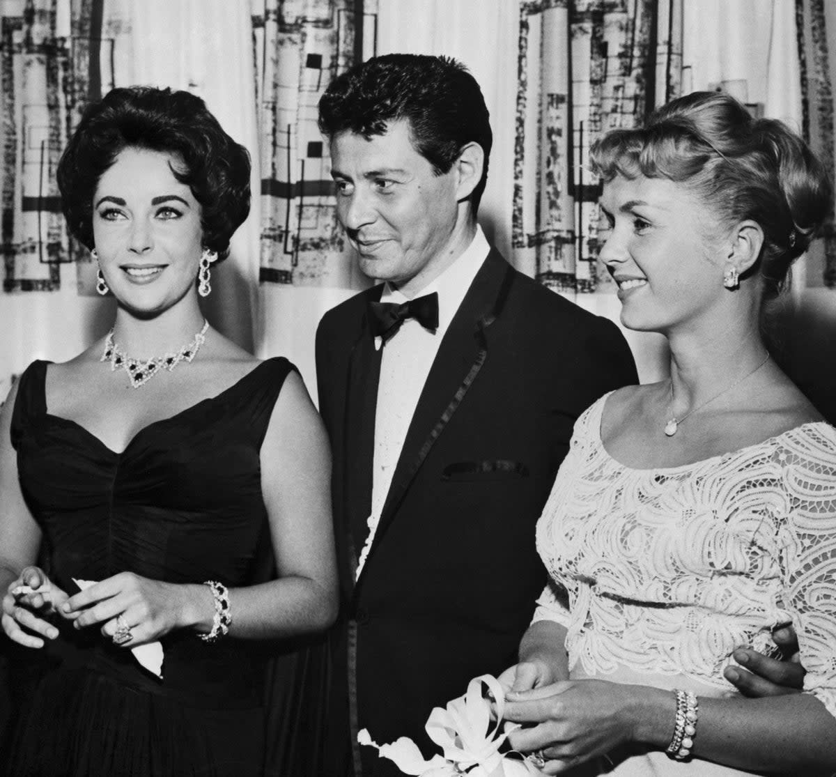 Liz Taylor, Eddie Fisher and Debbie Reynolds celebrated the Tropicana’s opening night together, two years before their love trial set global gossip pages atwitter; following Reynolds granting a quick Nevada divorce, Taylor and Fisher married in Vegas in May 1959 on the same day he gave another Trop performance (Bettmann Archive)