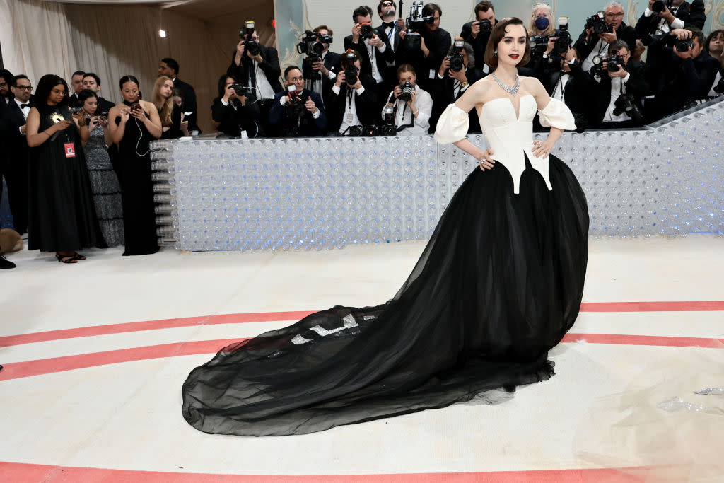 Lily Collins walks the red carpet at the 2023 Met Gala on May 1 at Metropolitan Museum of Art in New York City. (Photo: Jamie McCarthy/Getty Images)