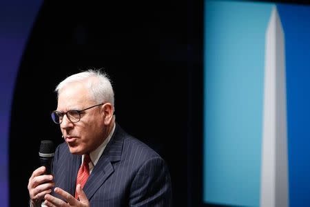 Carlyle Group co-founder and CEO David Rubenstein participates in the Washington Ideas Forum, in Washington October 29, 2014. REUTERS/Jonathan Ernst