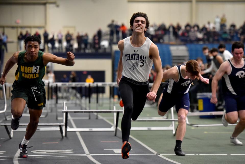 The Morris County Track & Field Championships are held at Drew University on January 18, 2022. Laron Blackwell of Morris Knolls places second and Jackson Koury of Chatham High School, center, places first, and Frank Zarro of Randolph, on right, places third in the finals of the 55M hurdles.