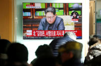 People watch a TV broadcasting a news report on North Korea firing what appeared to be an intercontinental ballistic missile (ICBM) that landed close to Japan, in Seoul, South Korea, November 29, 2017. REUTERS/Kim Hong-Ji