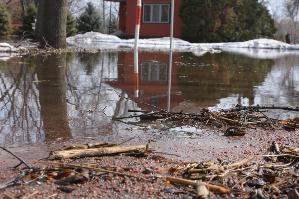 Water from the Big Sioux River slowly floods an intersection in Dell Rapids on March 23, 2019.