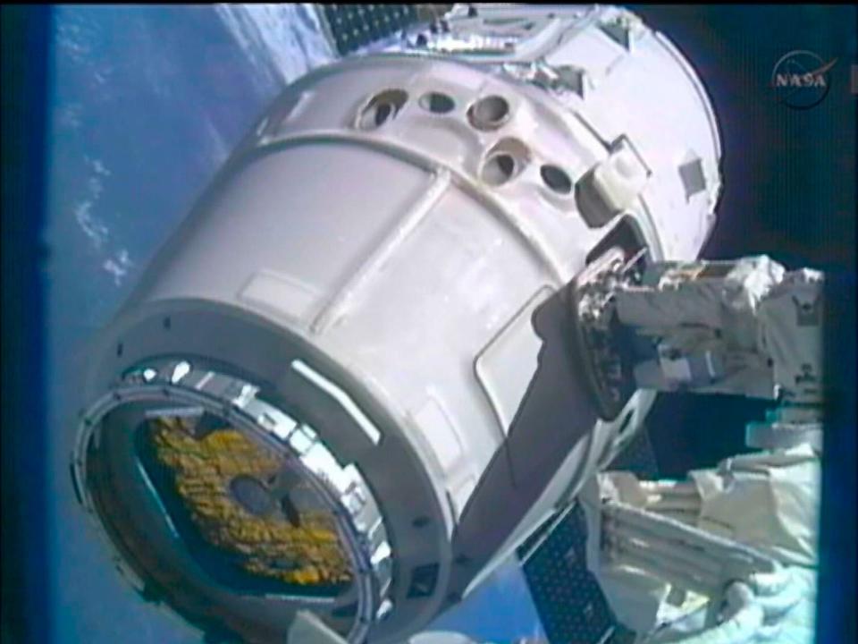 The SpaceX Dragon commercial cargo craft is moved into position for docking with the International Space Station May 25, 2012