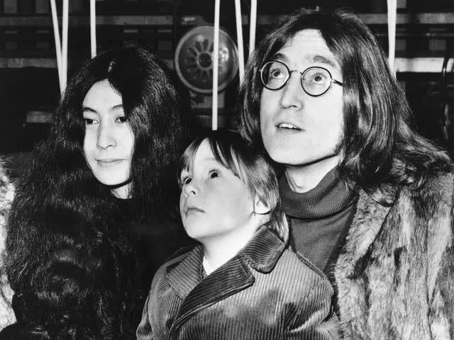 <p>Bettman</p> Yoko Ono and John Lennon with his son Julian in 1968.
