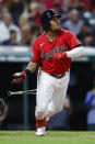 Cleveland Guardians' Jose Ramirez watches his RBI single off Detroit Tigers relief pitcher Joe Jimenez during the eighth inning of a baseball game Tuesday, Aug. 16, 2022, in Cleveland. (AP Photo/Ron Schwane)