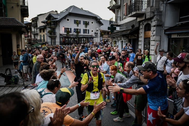 <span class="article__caption">U.S. trail runner Courtney Dauwalter competes during the 20th edition of The Ultra Trail du Mont Blanc (UTMB) in Chamonix, France, in 2023. (Photo: JEFF PACHOUD/AFP via Getty Images)</span>