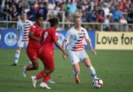 Oct 7, 2018; Cary, NC, USA; United States midfielder Samantha Mewis (3) passes the ball in front of Panama forward Karla Riley (9) during the first half of a 2018 CONCACAF Women's Championship soccer match at Sahlen's Stadium. Rob Kinnan-USA TODAY Sports