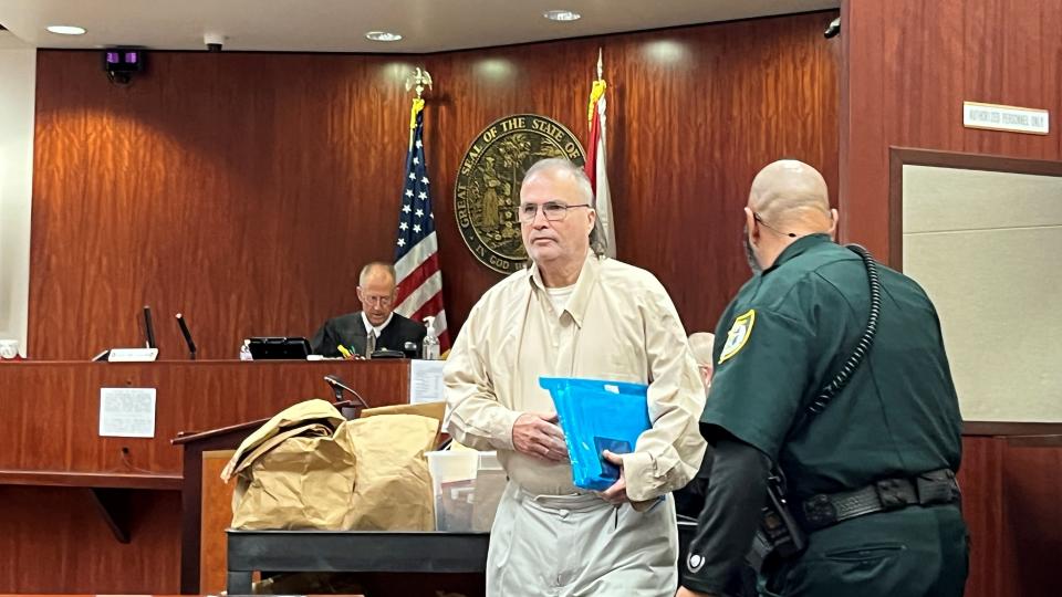 Asbury Lee Perkins, 64, who is acting as his own attorney, enters the Indian River County Courthouse Oct. 11, 2022 shortly before his first-degree murder trial begins in the November 2015 shooting death of his former wife, Cynthia Betts.