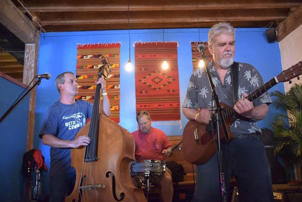 Blues-rocker Michael Wolfe and his band, The Wolfe Gang -- Robb Harrington, bass, and Gene Carmen, drums -- are longtime fixtures on the Wilmington music scene.