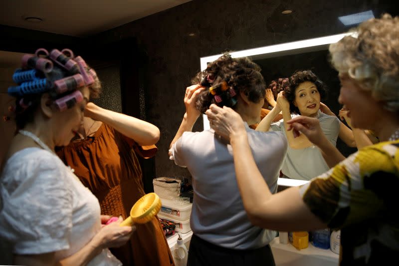 Elderly model group "Glamma Beijing" perform catwalk in Beijing's CBD area following the coronavirus disease (COVID-19) outbreak