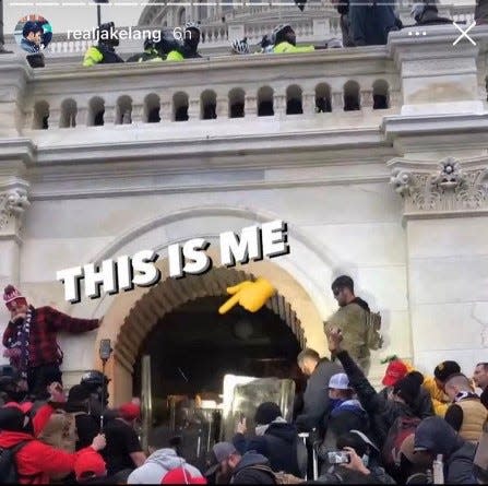 Edward "Jake" Lang posted this photo taken at an entrance to the U.S. Capitol on his Instagram account after the Jan. 6 riot, the FBI says in an affidavit.