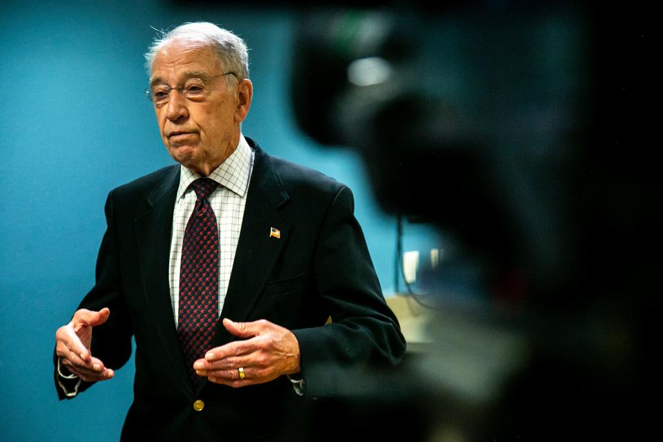 U.S. Sen. Chuck Grassley, R-Iowa, talks to reporters after a roundtable discussion.