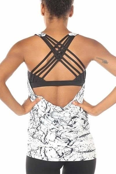 You'll love this top if you have a larger bust because it'll keep you supported whether you're doing yoga or running a marathon.<br /><br /><strong>Promising review:</strong> "Omg, this is the BEST workout top EVER! I'm really busty (38DD) and have always struggled to find sports bras that really hold the girls down but won't come undone (like the zip-up ones). I'm curvy and have love handles that I'm self-conscious about, so it's hard to find a top that isn't really loose but not terribly formfitting, and this top is it! It hugs you tight on top and is supportive enough that you feel secure, and is loose at the bottom, so it's not tight around your midsection. Size up if you're busty like me! I normally wear a L but decided to buy an XL due to others' advice and it fits perfectly. I'm going to buy more, I love it so much!" &mdash; <a href="https://www.amazon.com/gp/customer-reviews/R2X29LRMT7JSWR?&amp;linkCode=ll2&amp;tag=huffpost-bfsyndication-20&amp;linkId=cbb5d09aea40af71d838ab62df227725&amp;language=en_US&amp;ref_=as_li_ss_tl" target="_blank" rel="nofollow noopener noreferrer" data-skimlinks-tracking="4978705" data-vars-affiliate="Amazon" data-vars-href="https://www.amazon.com/gp/customer-reviews/R2X29LRMT7JSWR?tag=bfabby-20&amp;ascsubtag=4978705%2C5%2C21%2Cmobile_web%2C0%2C0%2C301468" data-vars-keywords="cleaning,fast fashion" data-vars-link-id="301468" data-vars-price="" data-vars-product-id="15934929" data-vars-retailers="Amazon">Brittany</a><br /><br /><a href="https://www.amazon.com/icyzone-Workouts-Clothes-Activewear-Built/dp/B01LXJ90ZE?&amp;linkCode=ll1&amp;tag=huffpost-bfsyndication-20&amp;linkId=70dbdbcdc8b6dc21eb29911ab23473bb&amp;language=en_US&amp;ref_=as_li_ss_tl" target="_blank" rel="noopener noreferrer"><strong>Price: $22.50+ (available in sizes S-XXL and in 18 colors and patterns)</strong></a>