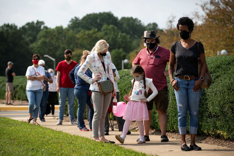 People vote at an early voting site in Fairfax, Virginia