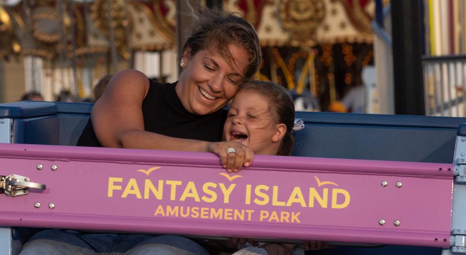 Visitors enjoy the Atlantic Scrambler at Fantasy Island in Beach Haven on Friday night of July 4th weekend. 