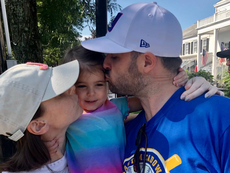 Jillian and James Breslin on vacation with their daughter, Emilia.