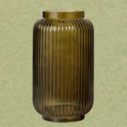 A ribbed glass vase