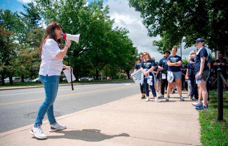 Rebecca Geiger from the Penn State Gender Equity Center talks to the crowd before the “Roar and Rally” walk to celebrate the 50th Anniversary of Title IX on Thursday, June 23, 2022.