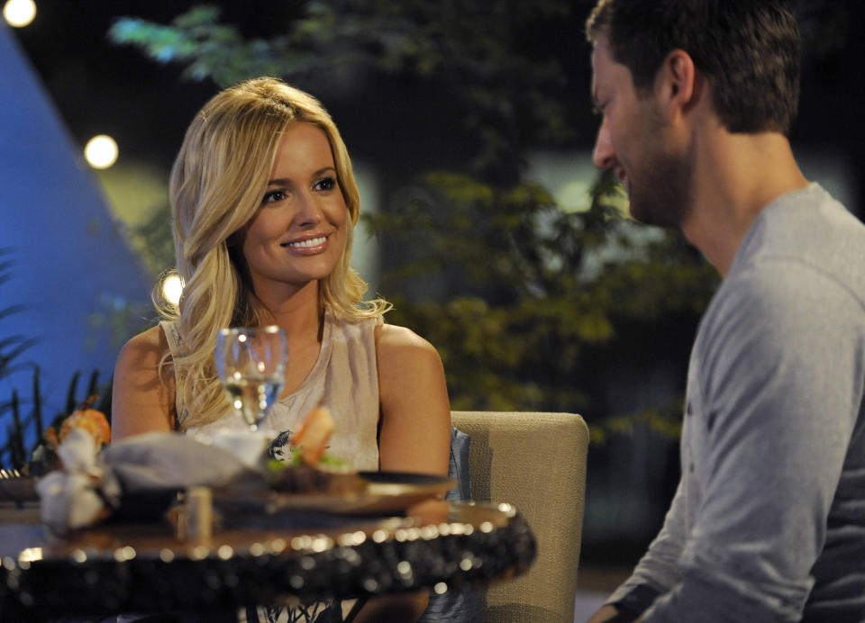 In this March 20, 2012 image released by ABC, Emily Maynard, left is shown on "The Bachelorette," in Charlotte, N.C. Maynard talks about what she's doing differently this time around as ABC's "Bachelorette." She got engaged last year to Brad Womack in the season finale of "The Bachelor" but their relationship didn't work out. (AP Photo/ABC, Angeline Herron)