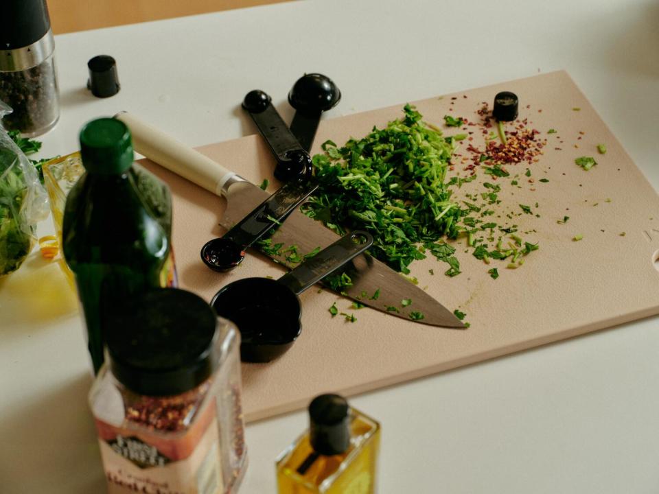 Spices lined up on a chopping block