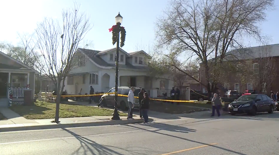 Police officers at a crime scene in Missouri.