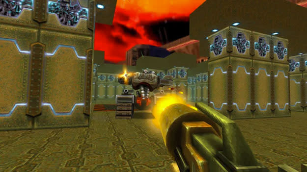 Screenshot from Quake II Remastered, in which a weapon held from the player's point of view is pointed at a thing in the distance.