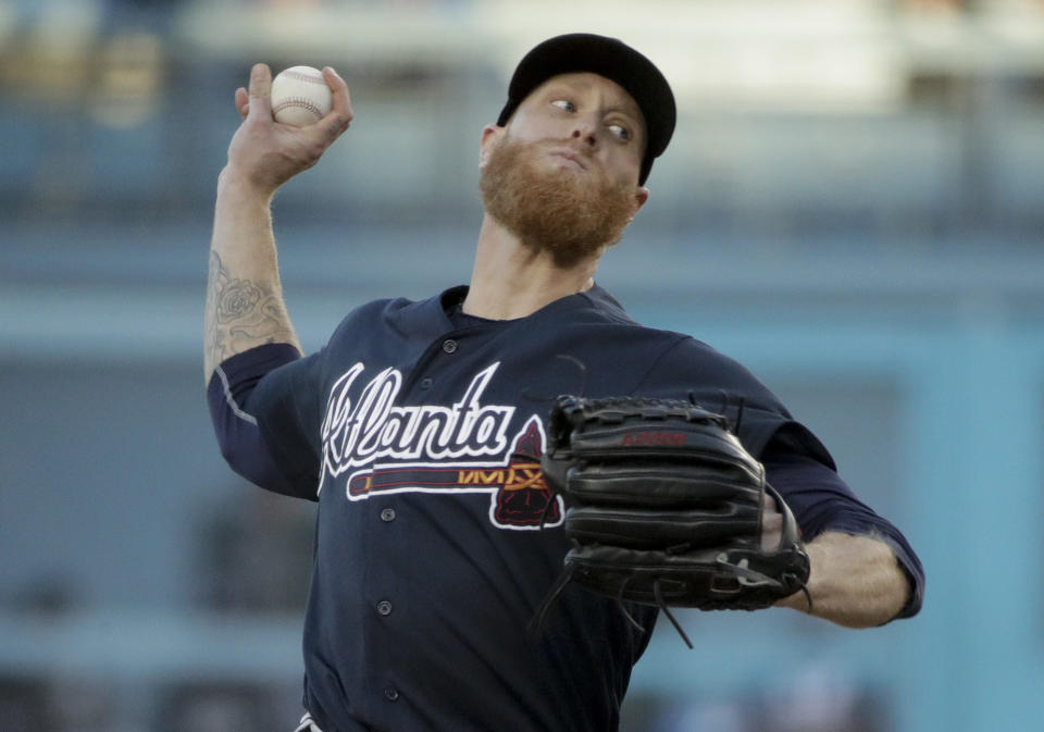 Atlanta Braves starting pitcher Mike Foltynewicz throws against the Los Angeles Dodgers during the first inning in Game 1 of a baseball National League Division Series on Thursday, Oct. 4, 2018, in Los Angeles. (AP Photo/Jae C. Hong)