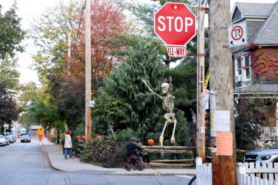 A giant skeleton is seen outside a house in Toronto on October 13, 2023.<span class="copyright">Mert Alper Dervis—Anadolu/Getty Images</span>