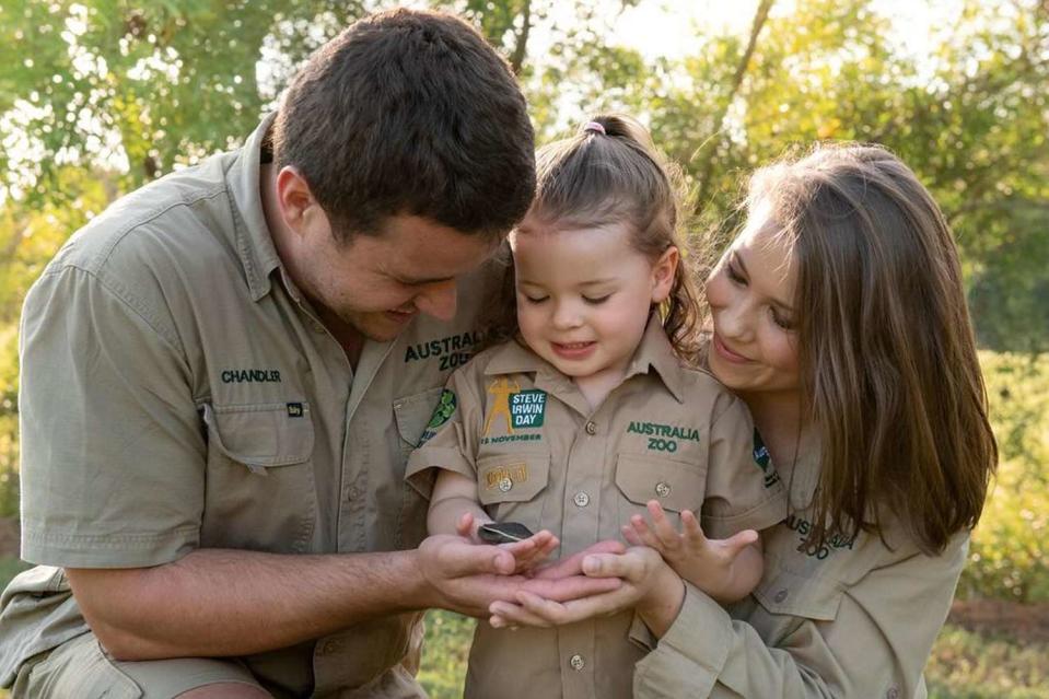 <p>Instagram/bindisueirwin</p> Chandler Powell and Bindi Irwin with their daughter Grace.