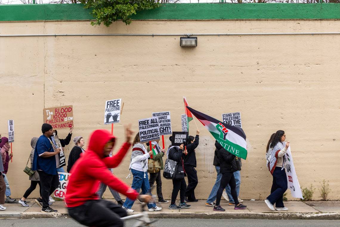 About 100 demonstrators rally against Vice President Kamala Harris’s visit to Durham, calling for a ceasefire in the Israel-Gaza conflict on Friday, March 1, 2024, in downtown Durham, N.C.