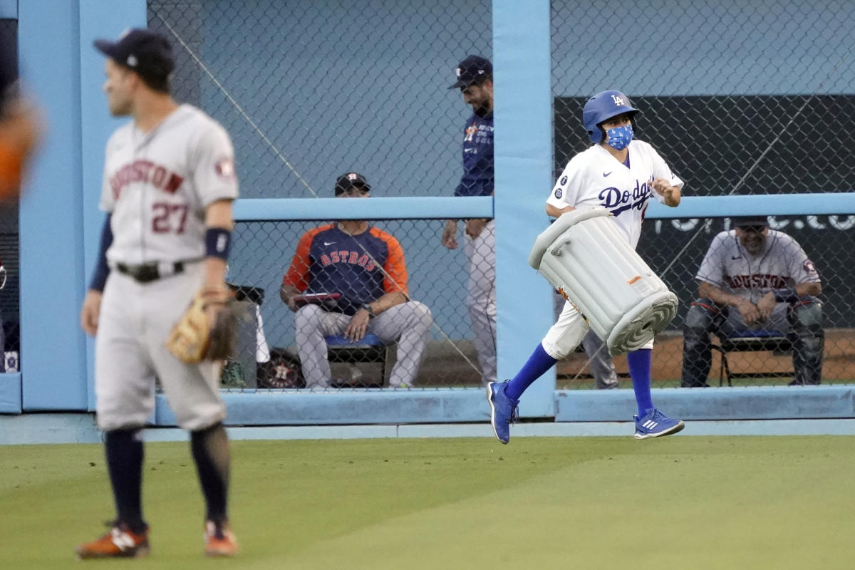 Houston Astros second baseman Jose Altuve (27) high fives teammate Yuli  Gurriel after hitting a game tying three-run home run against the Los  Angeles Dodgers in the fifth inning in the 2017