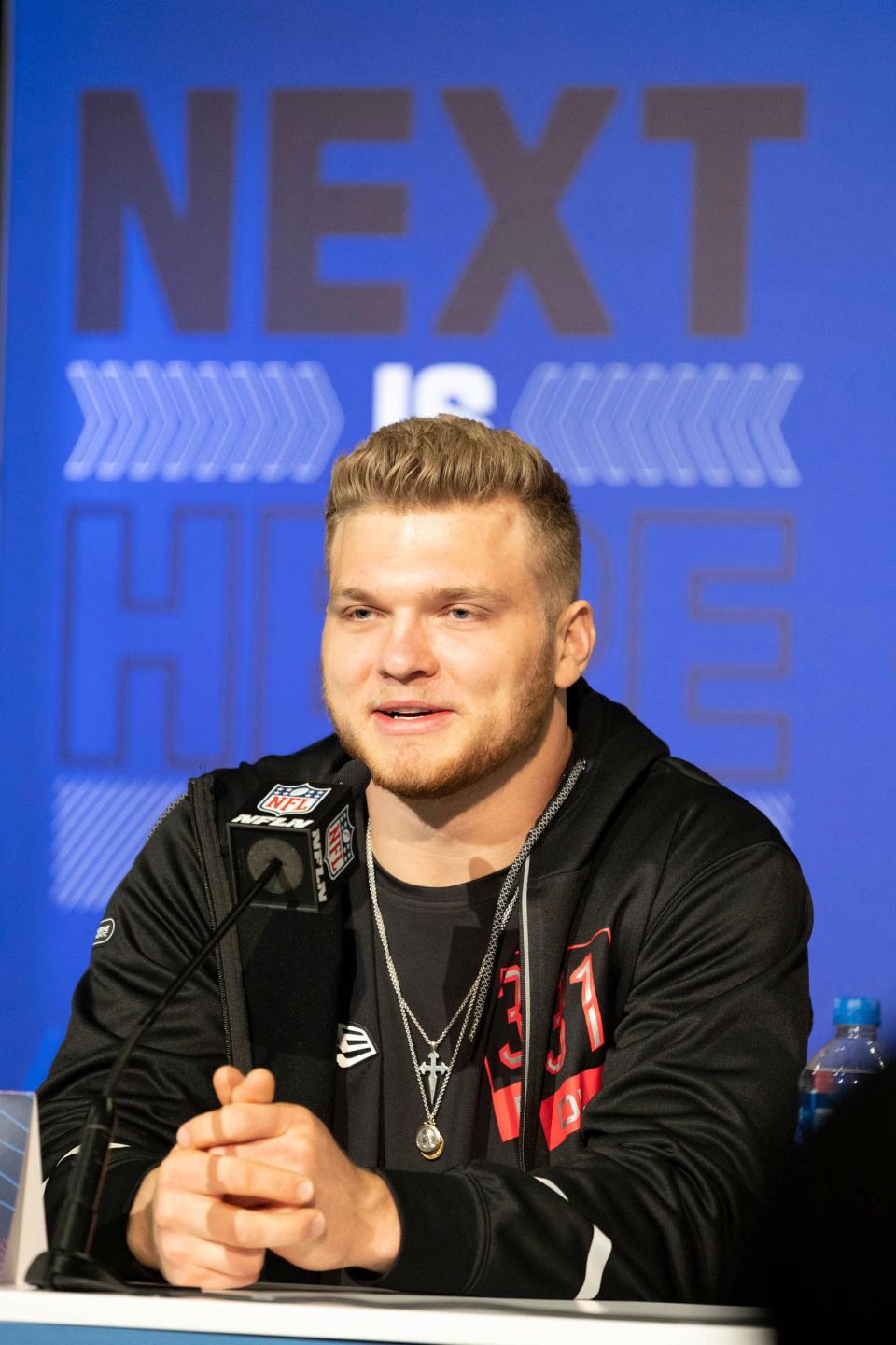 Michigan defensive lineman Aidan Hutchinson (DL31)  speaks during a news conference at the NFL combine in Indianapolis on Friday, March 4, 2022.